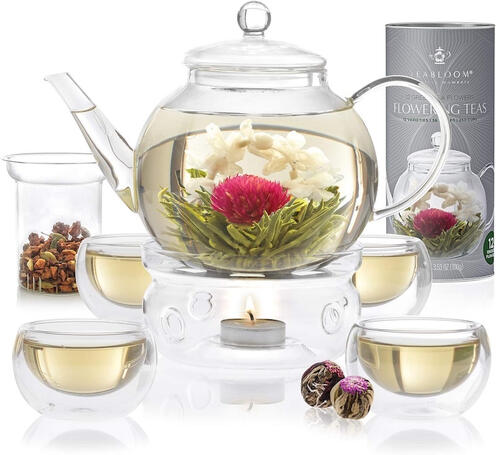An elegant 34-ounce glass teapot with a removable infuser, perfect for brewing your favorite loose-leaf or blooming teas. Its heatproof design ensures durability and style for your tea rituals.